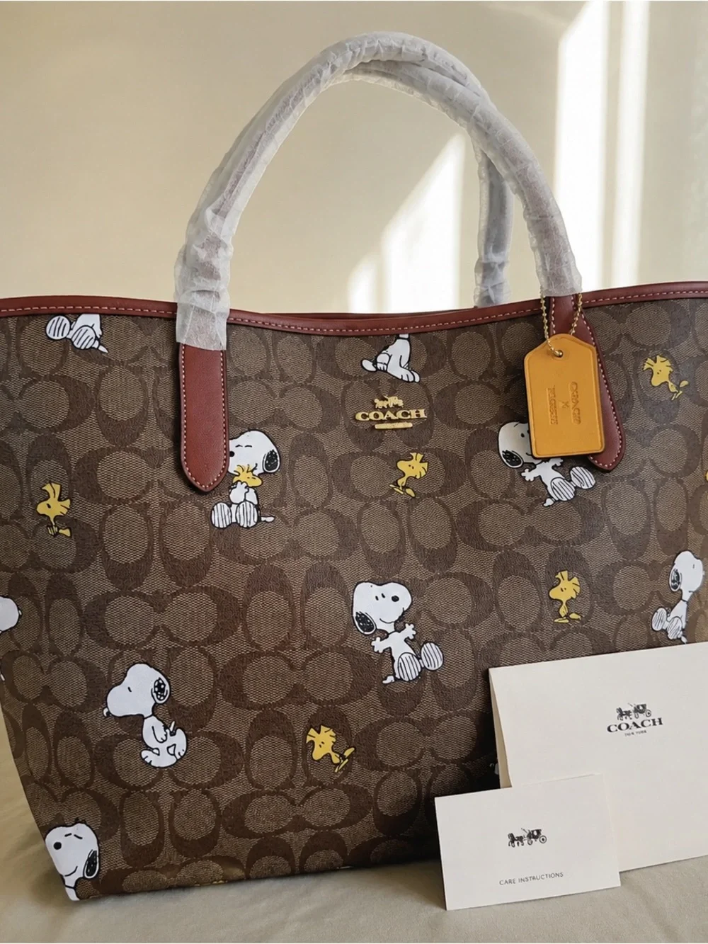Coach Brown Signature Snoopy Tote with Yellow Woodstock Accents